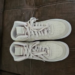 Women's high top Nike shoes.  Worn twice and daughter decided she didn't like